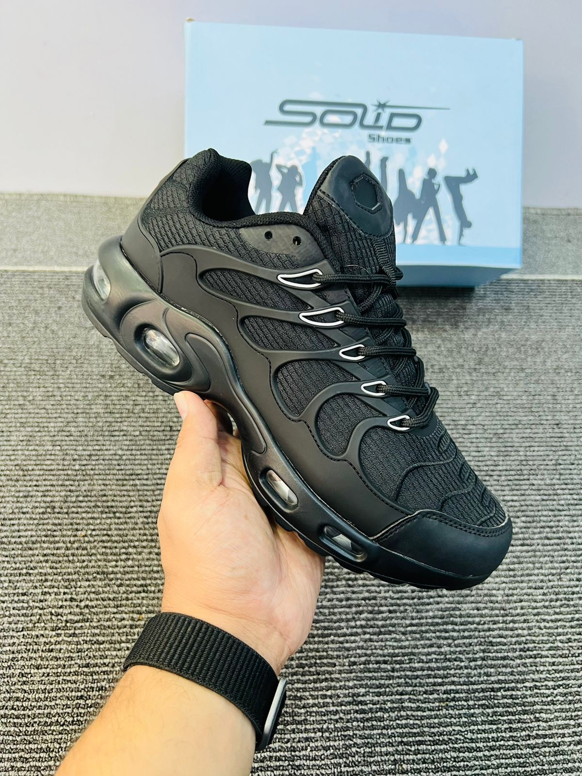 Imported black running shoes